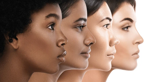 Side profile of four diverse women with different skin tones