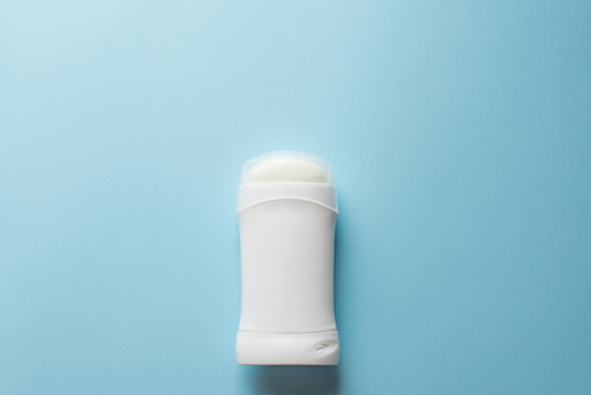 White deodorant stick with a transparent cap